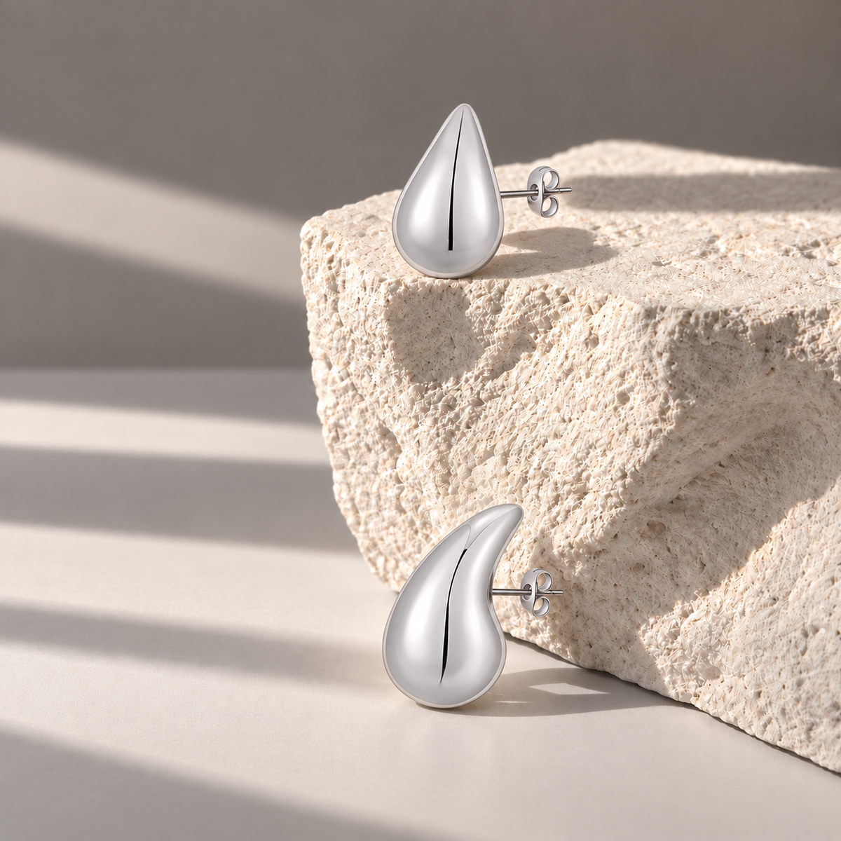 Solène Silver Teardrop Studs — limestone setting