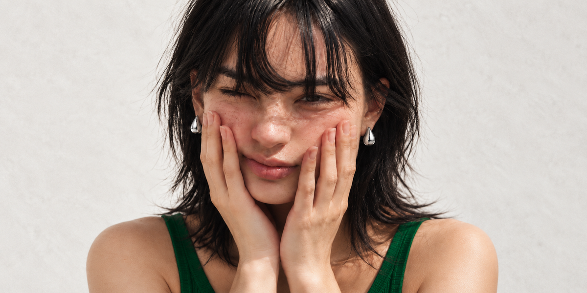 Zarrii silver edit earrings with emerald styling